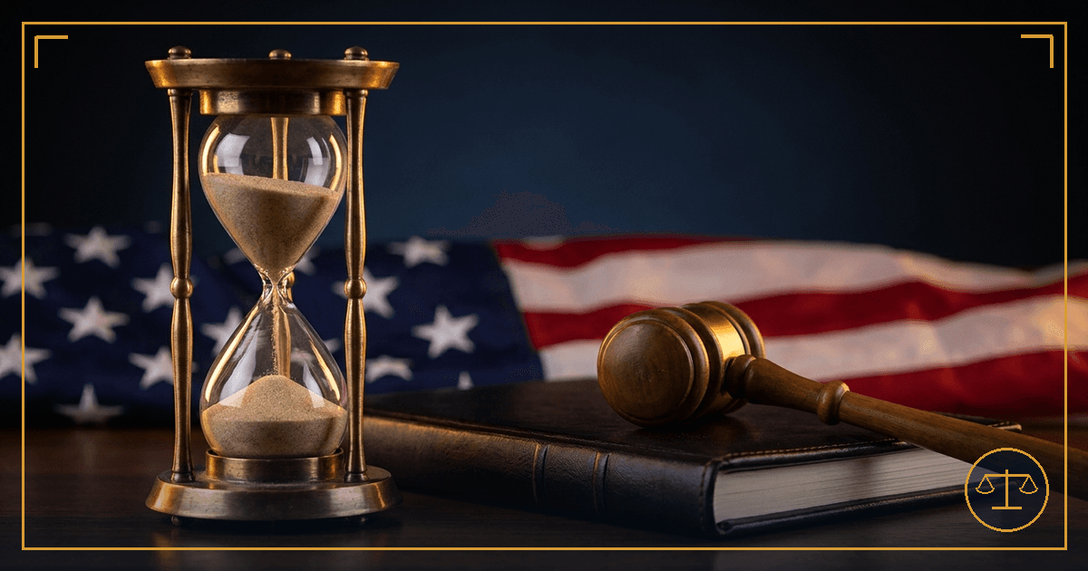 An antique brass hourglass with sand frozen mid-fall beside a closed legal case file and a gavel, an American flag softly out of focus behind, symbolizing a legal deadline that can, in narrow circumstances, still be paused.